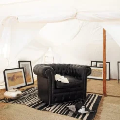 Maisons Du Monde Fauteuils Fauteuil Capitonné En Cuir Noir -Magasin De Chaises fauteuil capitonne en cuir noir 1000 10 26 50140320 2